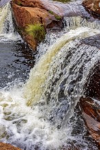 Small river and waterfall among the rocks of the Biribiri mountain range in Diamantina, Minas