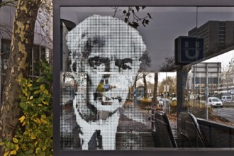 Portrait of Theodor Heuss on the glass pane at the underground exit Heussallee and Museumsmeile,