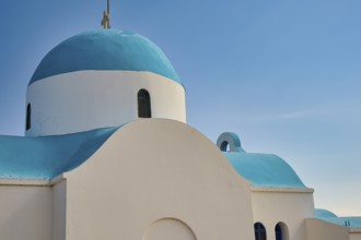 Side view of a white-blue church under a blue sky, Church of Profitis Ilias, above Nikia, Nikia,