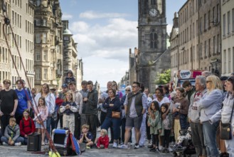 Audience at a performance, world's largest cultural festival The Fringe, High Street, Edinburgh,