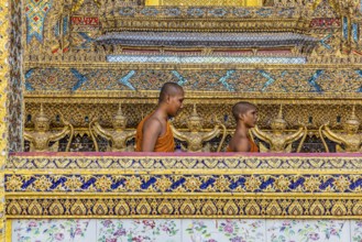 Wat Phra Kaeo temple, royal palace. Royal chapel with Buddhist monks and novices. Bangkok,