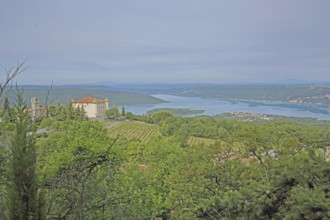 Renaissance castle and church, Aiguines, Lac de Sainte-Croix, Verdon reservoir, view, lake