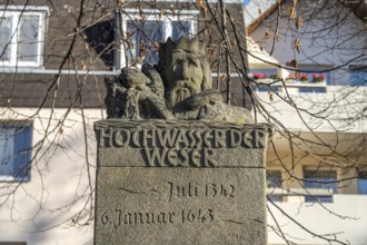 Column in memory of historic Weser floods in Hameln, Lower Saxony, Germany, Europe