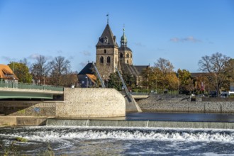 Weser Weir and St Boniface Minster in Hamelin, Lower Saxony, Germany, Europe