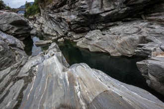 Rocks, granite rock formations in the Maggia River near Ponte Brolla, in the Maggia Valley, Valle