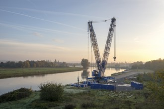 Harbour crane and Elbe at the entrance to Alberthafen, Dresden, Saxony, Germany, Europe