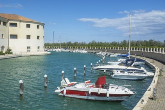 Leisure boats at quay at Hotel Marinagri in Lido di Policoro resort, Basilicata, Mediterranean Sea,