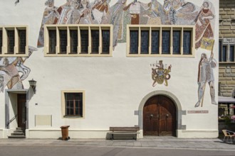 Facade of the Old Town Hall, dating back to the 14th century, with wall mosaic depicting the town's