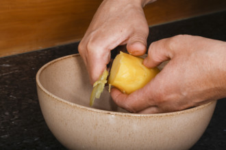 Swabian cuisine, preparation of Swabian potato salad with Stuttgarter Leberkäs in a