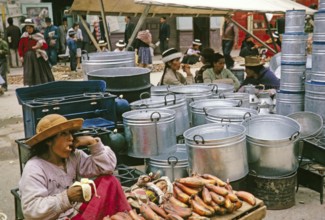 Trader with baby, street market, Huancayo, Peru, South America around 1962, South America