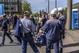 Steelworkers at a demonstration in front of the headquarters of ThyssenKrupp Steel Europe in