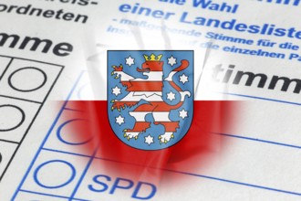 Symbolic image of the state election in Thuringia: Flag of Thuringia and close-up of a ballot paper