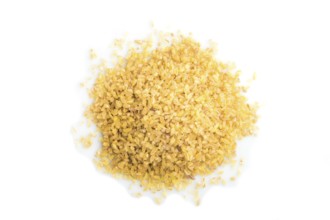 Heap of bulgur isolated on white background. Top view, flat lay, close up, macro