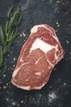 Fresh, raw rib eye steak, top view