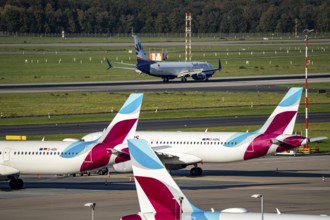 Düsseldorf Airport, Sunexpress Boeing 737 after landing, Eurowings Airbus aircraft in parking