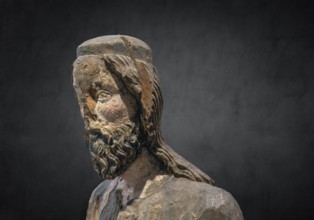 Detail of Christ, Palmesel, wooden figure c. 1350, on dark background, Diözesan Museum, Rottenburg,