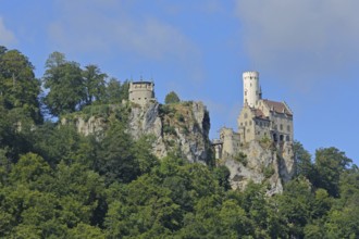 Castle built 19th century on mountain with rocks, forest, landscape, Honau, Lichtenstein, Albtrauf,