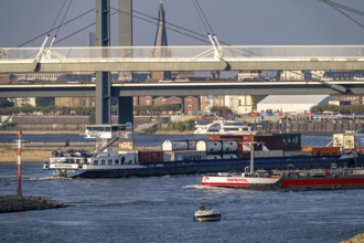 Cargo ships on the Rhine near Düsseldorf, bridge over the Media Harbour, Oberkassler Rhine Bridge,