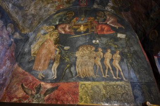 Painted religious picture in an Orthodox church with numerous figures and spiritual themes, scenes