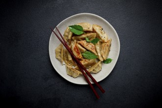 Japanese fried dumplings, gyoza, sesame seeds, top view, no people