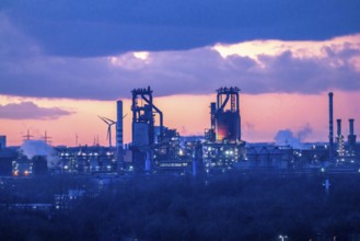 Skyline of the Duisburg steel site, Thyssenkrupp Steel Europe, in Duisburg-Bruckhausen, sunset,