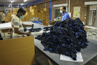 Employees of Inter Market Knit Private Limited producing socks. Lahore, 22.08.2024. Photographed on