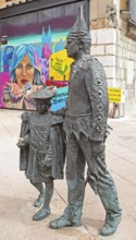 Street art with typical holiday hat in the historic centre of Burgos, province of Burgos, Castile