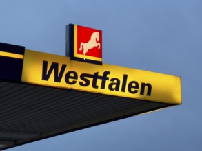 Logo with Westphalian horse and lettering Westfalen on petrol station of chain of petrol stations