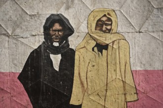 Mural painting representing two famous religious leaders in Senegal : Ahmadou Bamba (on the right)