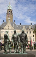 A sculpture in front of the historic Stadhuis Rotterdam, Netherlands constructed 1920 with Mari