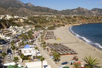 Playa Burriana sandy beach at popular holiday resort town of Nerja, Malaga province, Spain, Europe