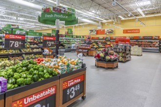 Produce department displays fruits and vegetables at Walmart shopping center in Biloxi,