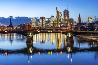 Skyline of the city centre of Frankfurt am Main, river Main, dusk, Ignatz-Bubis-Brücke, Hesse,