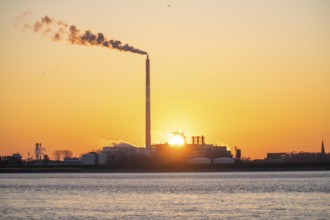 Sunset over the Weser estuary with a view from the ferry harbour in Bremerhaven to Nordenham,