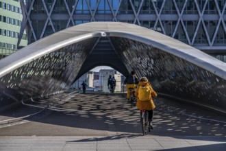 The Parkbruk, cycle and pedestrian bridge in the city centre of Antwerp, crosses a multi-lane city