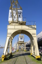 Harbour cranes on the Scheldekai, the world's largest collection of historic cranes, are part of