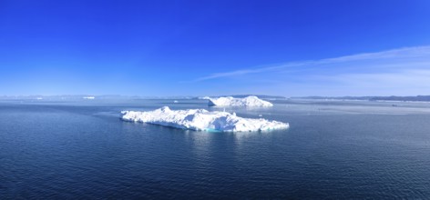 Iceberg seen from cruise ship vacation in Greenland coast in Arctic circle near Ilulissat Disko Bay