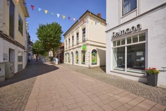 Fielmann acoustician and health food store in the pedestrian zone of Varel, district of Friesland,