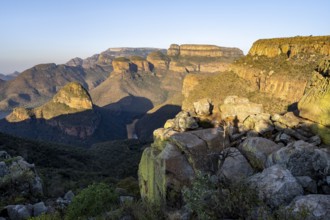 Sunset at Blyde River Canyon with Three Rondawels peak, view of canyon with Blyde River and Mesa