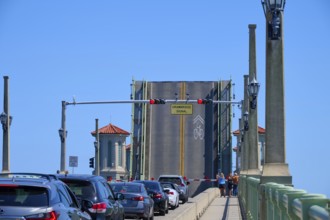 Traffic light, drawbridge and cars, with a sign, Bridge of Lions and raised bridge, St. Augustine,