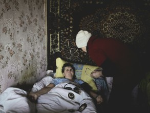 Tryohizbenka, Ukraine, Lilia Schwez on a visit to Valentina, 75, in the morning there were several