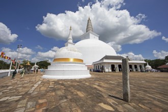 Sri Lankan pilgrims at the white stupa in the holy city of Anuradhapura, North Central Province,