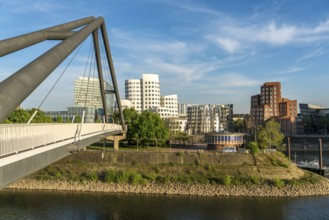 Bridge at the Media Harbour and the New Customs Yard with the Gehry buildings by architect and