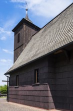 Cemetery and All Saints' Church, a historic traditional timber-frame church, which in its present