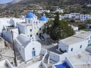 Village church and chapel among the whitewashed houses in the mountain village of Lagada, Amorgos,