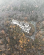 Aerial view of Hohenklingen Castle above Stein am Rhein on a foggy autumn day, Canton Schaffhausen,