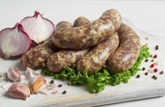 Raw kupaty, traditional Georgian sausages, raw sausages, with spices and herbs, Georgian cuisine