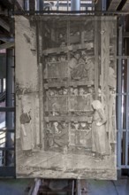 1920s old photograph showing coal miners in coal mining lift cage, elevator at Le Bois du Cazier