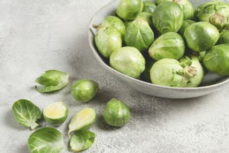 Fresh Brussels sprouts, raw, top view, on a gray table, no people