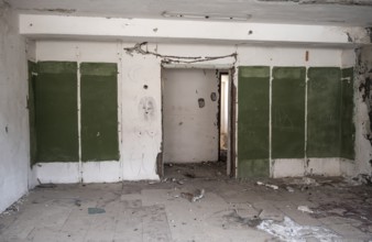 Abandoned, destroyed room in a residential building, Soviet apartment blocks, ghost town,